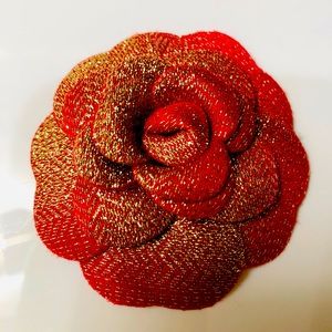 Chanel Camilia red and gold flower